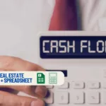 a person pointing to a calculator that says cash flow