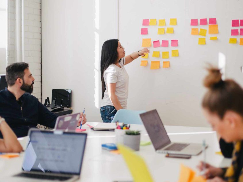 a meeting room with people