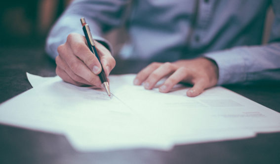 realtor writing a contract